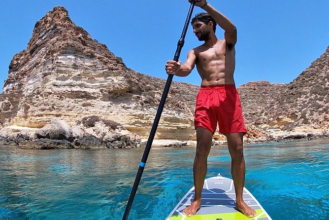 7 hours Boat trip to Lampedusa lunch, SUP and Snorkeling - La Tabaccara and the famous clear water