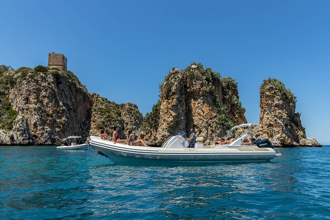 8-Hour Boat Tour from Castellammare del Golfo to San Vito Lo Capo - Cala Rossa and clear water full of fish