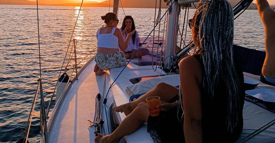 Alghero: Sunset Sailing Aperitif Experience - The Maddalenetta stop and Sardinian sea swim