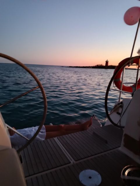 Alghero: Sunset Sailing Aperitif Experience - Aperitivo with local drinks, snacks, and music