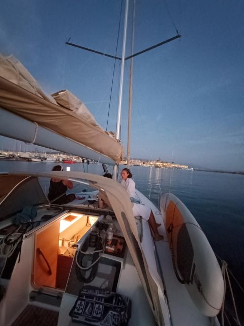 Alghero: Sunset Sailing Aperitif Experience - Sailing in front of Alghero