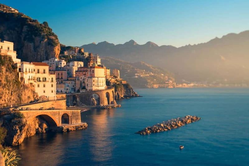 Amalfi: Sunset Boat Tour with Fruit and Drinks - The captains and the atmosphere on board