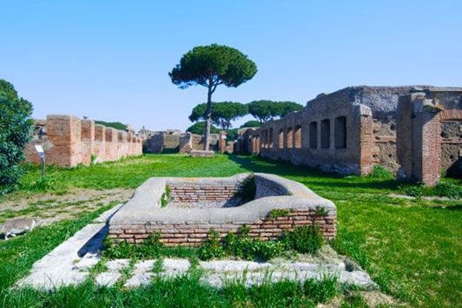 Ancient Ostia Antica Semi-Private Day Trip from Rome by Train with Guide - Walking down the Decumanus Maximus