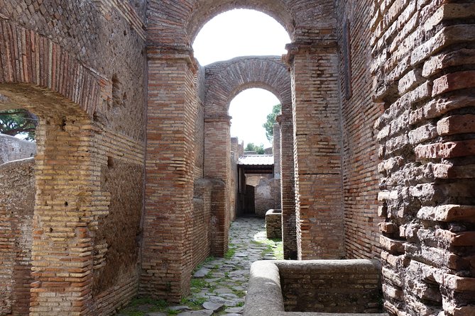 Ancient Ostia Antica Semi-Private Day Trip from Rome by Train with Guide - What the $59.26 price really covers