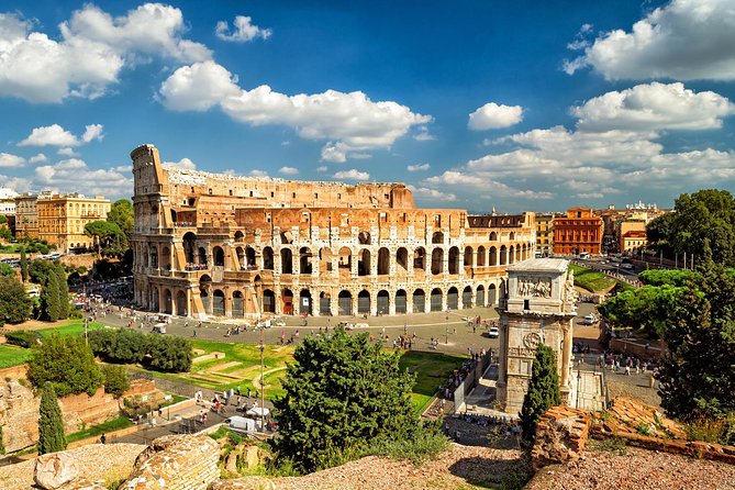 Ancient Rome Guided Tour: Colosseum, Forum and Palatine & Pick Up - Following the Sacred Way through ancient Rome
