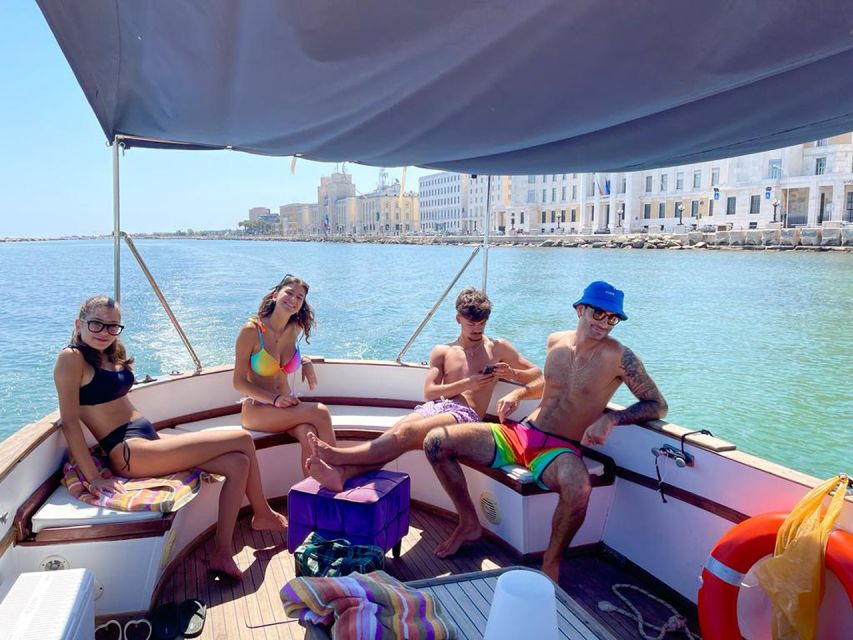 Bari by boat: admire the city from the sea with Aperitivo - What the vintage gozzo ride feels like