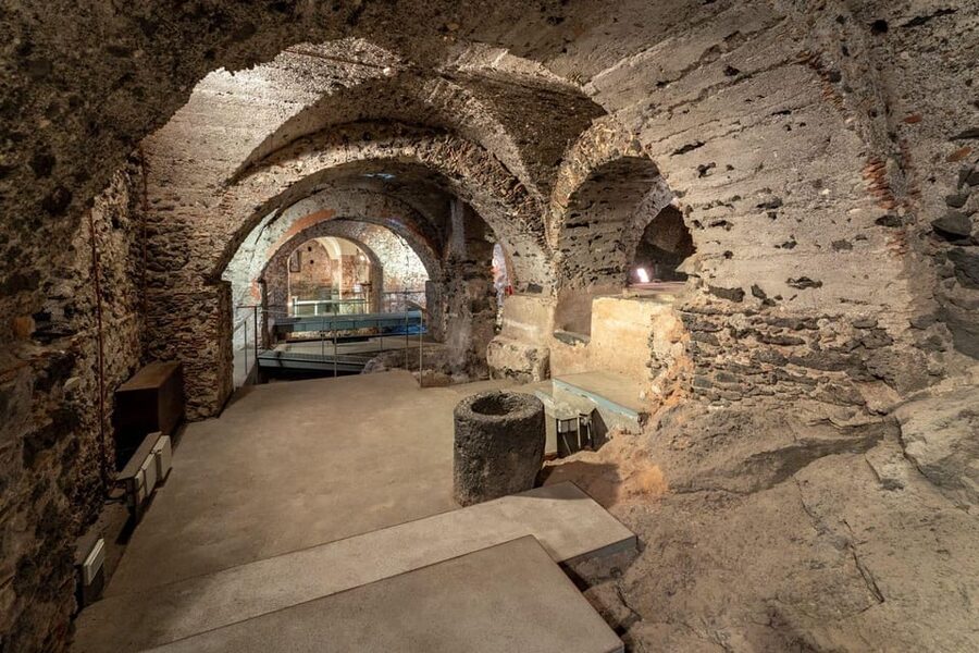 Benedictine Monastery of Catania - English Guided Tour - The lava-built cellar and university library