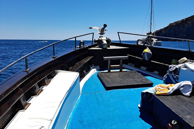 Boat excursion with lunch on board to discover Ischia - Maronti combines beach, fumaroles, and ancient thermal water