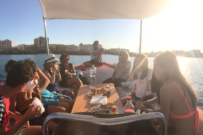 Boat tour of Ortigia Island and sea caves - Castillo Maniace and the island from offshore