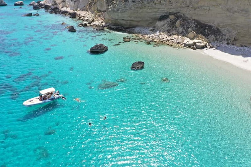 Cagliari: Boat Tour, 4 Stops, Swim, Snorkeling, & 1 Spritz - A skipper-led experience with music and local stories