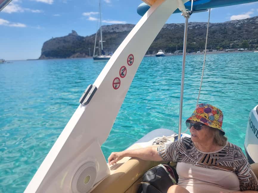 Cagliari: Boat Tour, 4 Stops, Swim, Snorkeling, & 1 Spritz - Cala Fighera and the coast’s most dramatic views