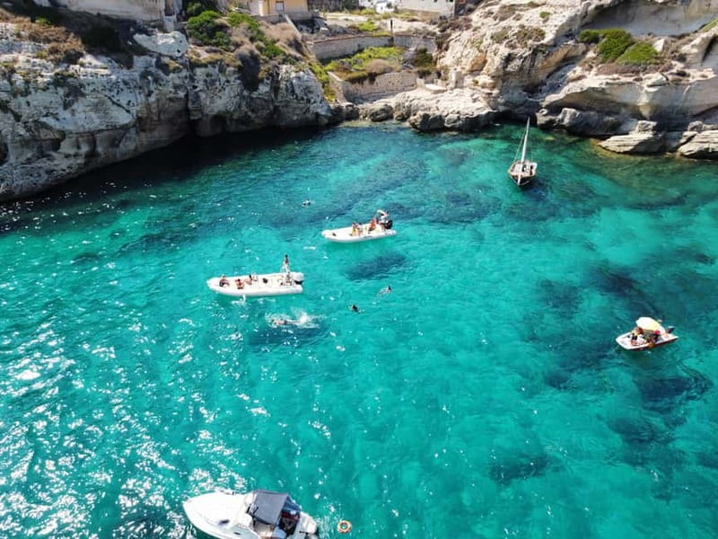 Cagliari: Boat Tour with 4 Swim Stops, Snorkeling & Prosecco - Prosecco, stories, and the social side