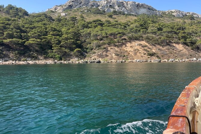 Cagliari Gulf Boat tour : 5 stops, snorkeling & local aperitif - Poetto ends with beach views and an aperitivo