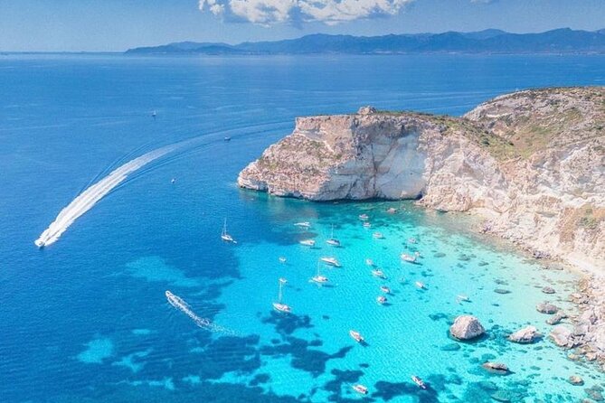 Cagliari Gulf Boat tour : 5 stops, snorkeling & local aperitif - Calamosca brings green water and a coastal tower