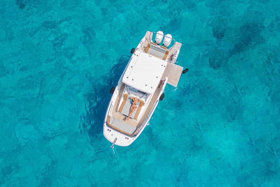 Cagliari: Luxury Motorboat Tour with 3 Swim Stops & Wine - Leaving Marina Piccola for Poetto Beach