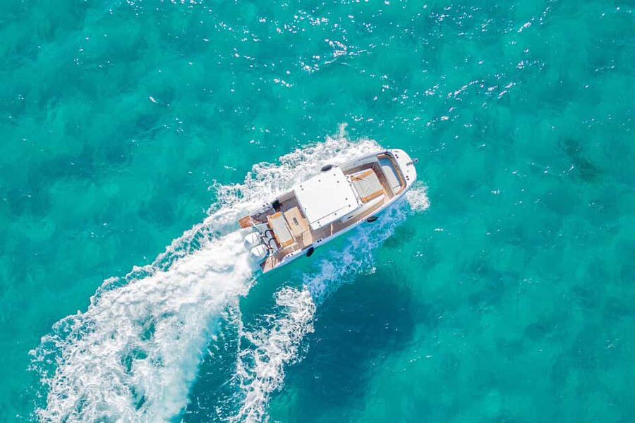 Cagliari: Luxury Motorboat Tour with 3 Swim Stops & Wine - The final stop near the Swimming Pools