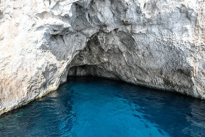 Capri Boat & Land Tour from Sorrento with Limoncello Tasting - Seeing Capri’s grottoes and cliffs by boat