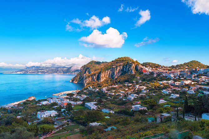 Capri Guided Boat Experience with Island Exploration and Transfer - The Natural Arch on Capri’s eastern coast