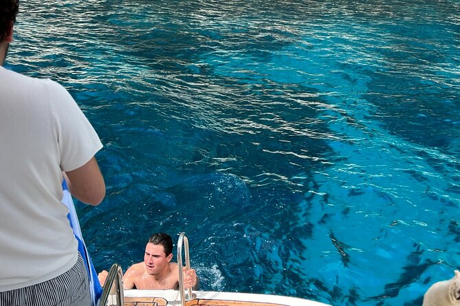Capri in a Day All Inclusive Premium Boat Tour + City Visit - Mermaid Rock and the southern coast