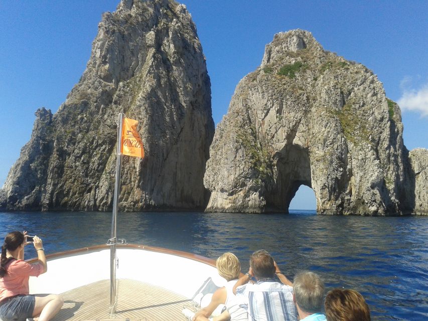 Capri: Island Boat Tour with Blue Grotto Stop - Natural Arch, Casa Malaparte, and the Faraglioni