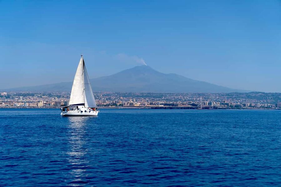 Catania: Cyclops Coast Cruise with Appetizer & Snorkeling - Black lava along the Catania coast