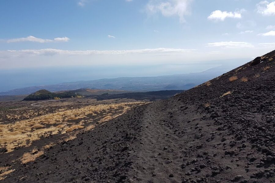 Catania: Mount Etna Trekking Trip off the Tourist Path - Lava flows, plants, and the cave visit