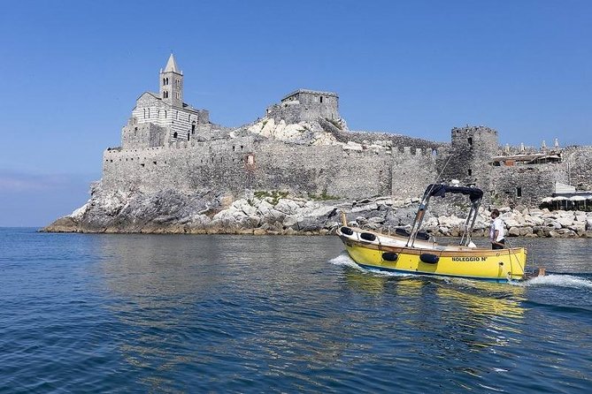 Cinque Terre Sunset Tour by Boat - A small group with a captain at the helm