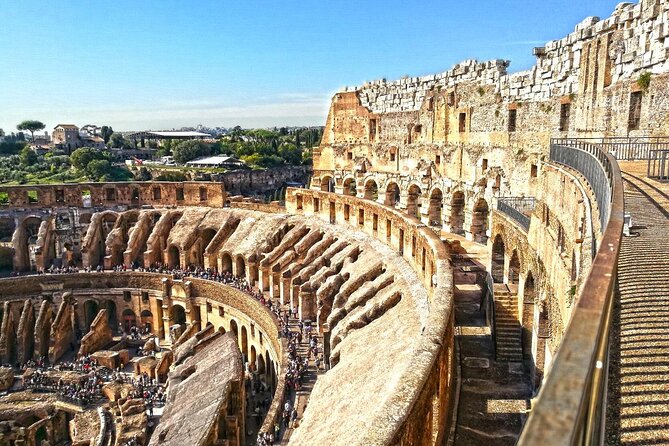 Colosseum Express Guided Tour and Ancient Rome Admission Included - Entering the Colosseum and Finding the Best View