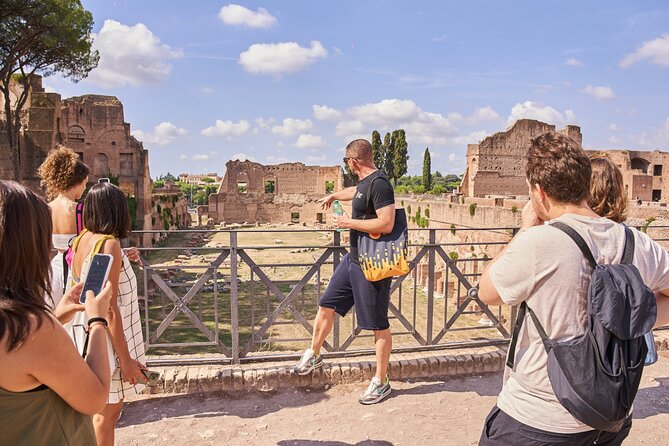 Colosseum, Palatine Hill and Roman Forum Guided Tour - Entering the Colosseum for a one-hour guided visit