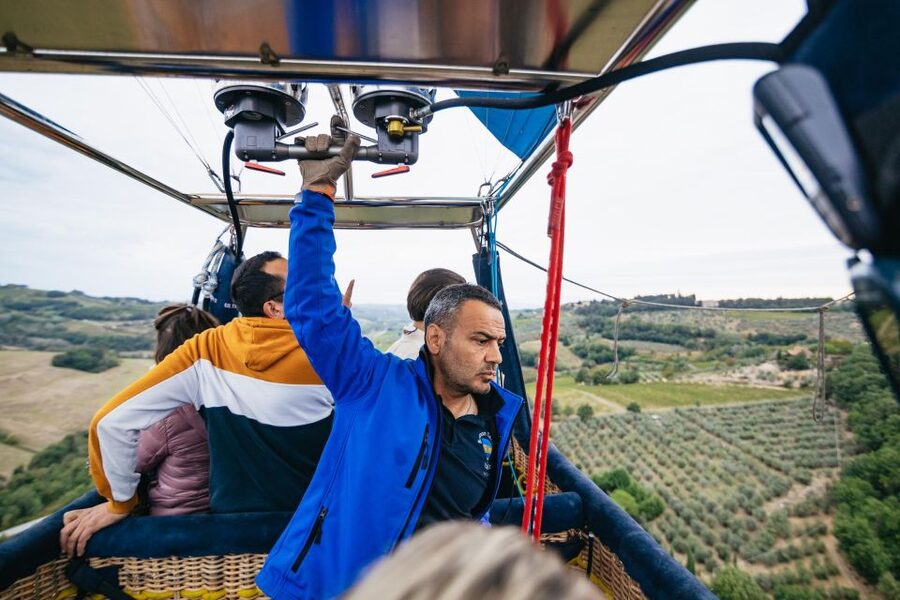 Florence: Balloon Flight Over Tuscany - Boarding the basket and rising to 2,000 feet