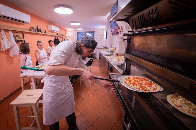 Florence Cooking Class The Art of Making Gelato & Authentic Pizza - Sampling flavors before your own pizza goes into the oven