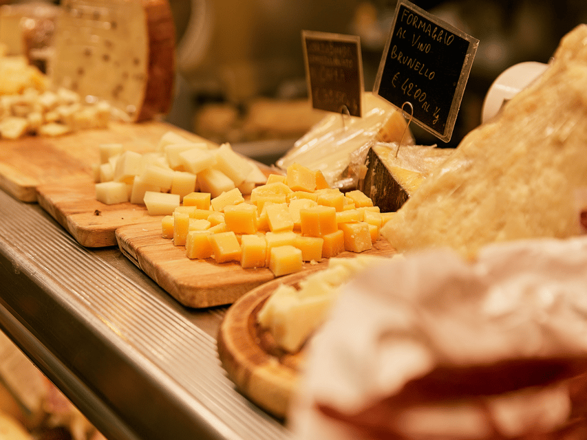 Florence: Cooking Class with Local Food Market Tour - Sitting down to a Tuscan feast
