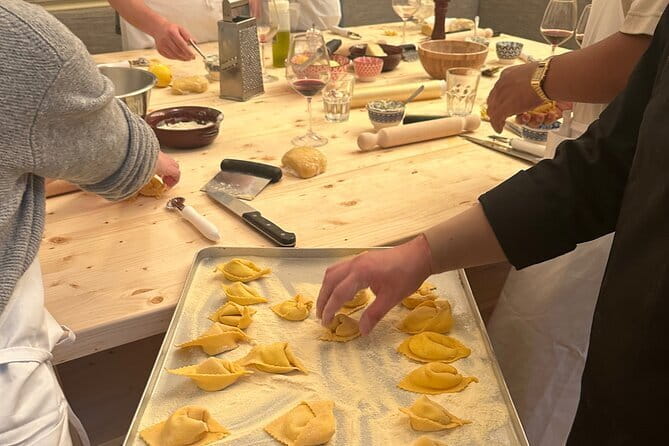 Florence: Pasta Cooking Class with Unlimited Wine - Cooking pasta inside Florence’s medieval tower