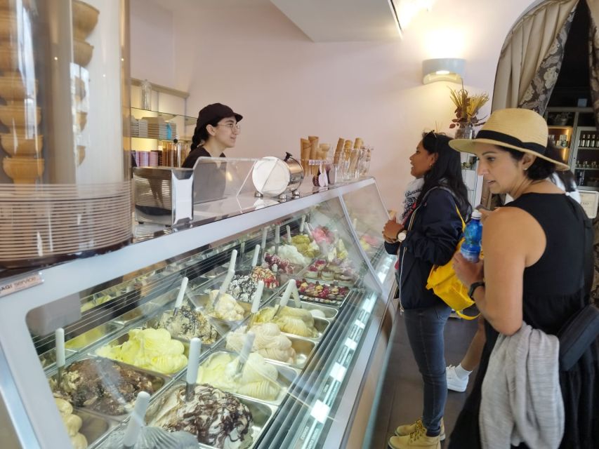 Florence: Street Food Walking Tour with Wine - Crossing toward Ponte Vecchio