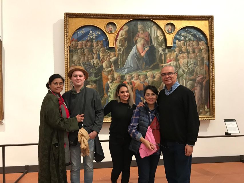 Florence: Uffizi Gallery Small Group Guided Tour - Meeting the guide beside Leonardo da Vinci