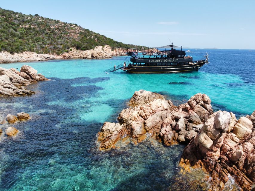 From Cannigione: La Maddalena Archipelago Boat Trip - Food, shade, music, and comfort onboard