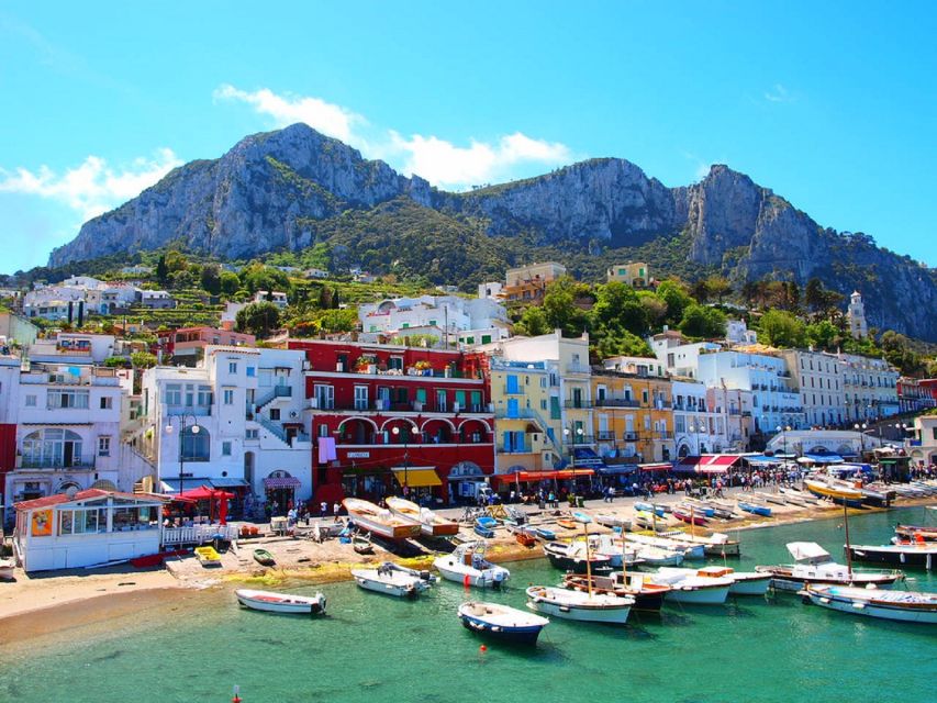 From Naples: Capri Boat Day Trip with Drinks - A small boat with a friendly, social mood