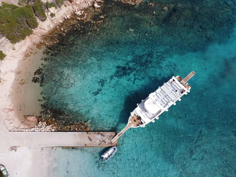 From Palau: 4 stops boat tour to La Maddalena archipelago - La Maddalena town adds a welcome change of pace