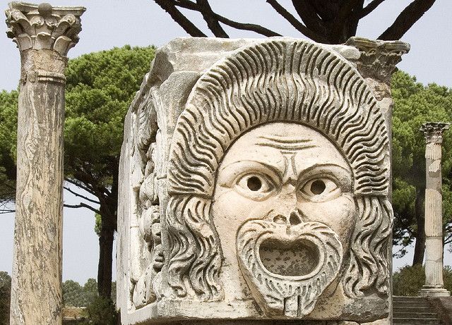 From Rome: Ostia Antica Guided Half-Day Trip by Train - Entering a port city on the Decumanus Maximus