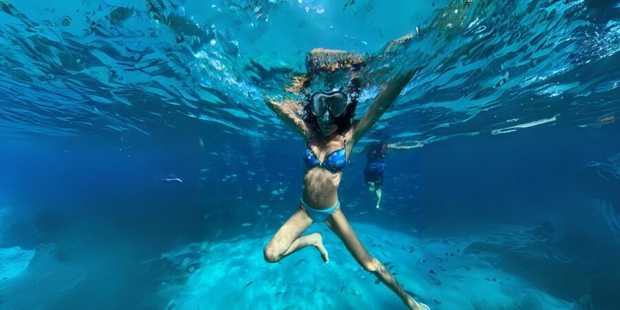 From Trapani: Favignana and Levanzo Egadi Island Day Cruise - Cala Azzurra starts the swimming day