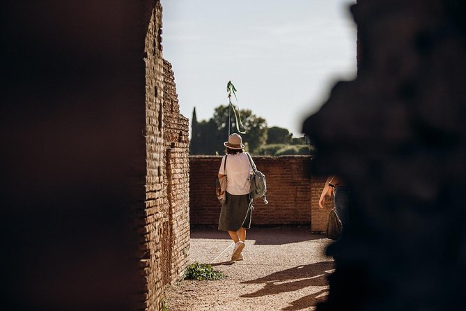 Gladiator’s Gate: Special Access Colosseum Tour with Arena Floor - Walking through the Roman Forum in 40 minutes