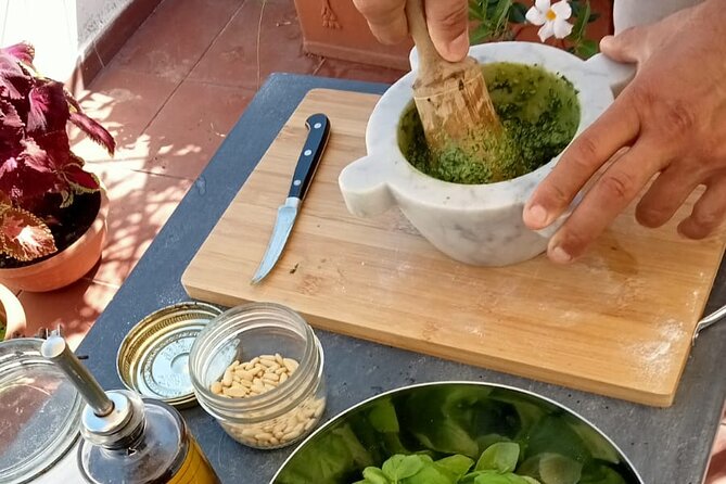 Homemade Pasta and Pesto Class with a Local Chef in Genoa - Making pesto the Ligurian way