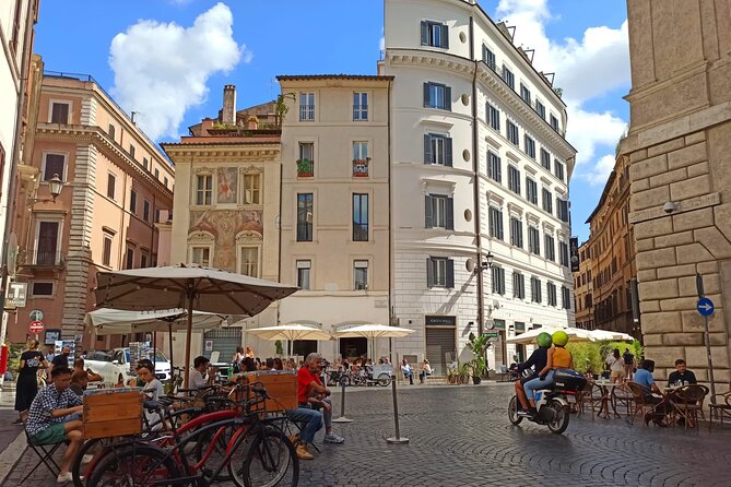 Jewish Ghetto & Piazza Navona: Food, Wine & Sightseeing Rome Tour - Largo Argentina and ancient ruins