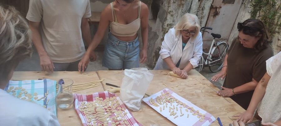 Lecce: Pasta Making Class in 1400s-Era Courtyard with Wine - From worktable to shared meal