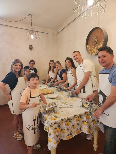 Milan: Pasta and Tiramisu Cooking Class with Wine - A Prosecco welcome inside a Milan restaurant