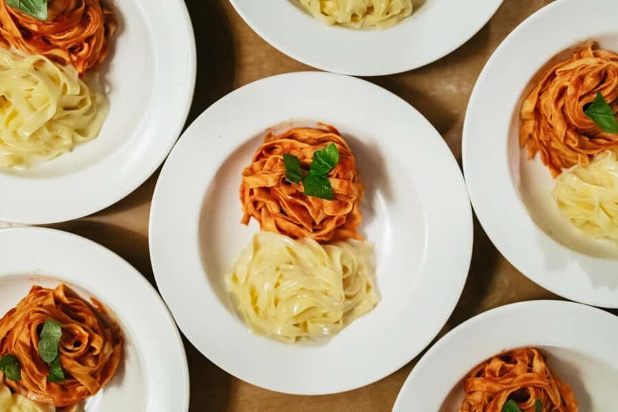 Milan: Pasta & Tiramisu Cooking Class with Premium Products - Kneading eggs and flour into fresh pasta