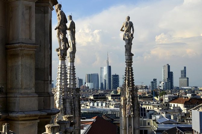 Milan Super Saver: Skip-the-line Duomo and Rooftop Tour - Walking among 3,400 statues on the roof