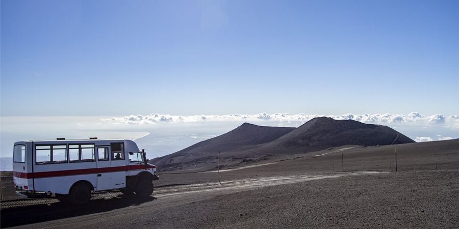 Mount Etna: Roundtrip Cable Car and 4x4 Bus Ticket - Walking near the Central Craters at 2,900 meters