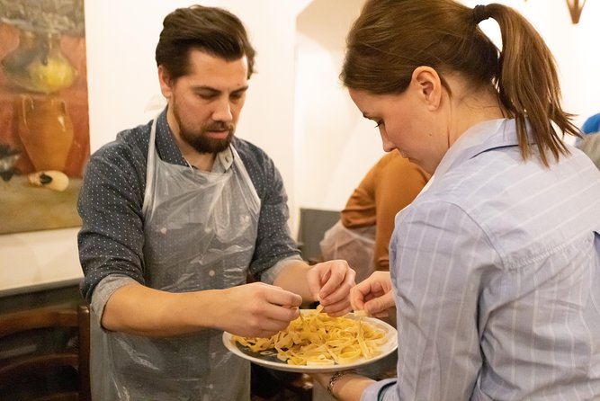 Naples Pasta Class: Fettuccine & Ravioli with Grandma’s Recipe - Rolling dough into fettuccine