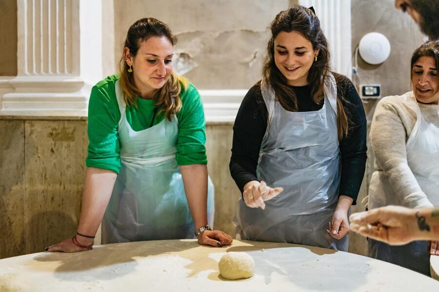 Naples: Pizza-Making Workshop with Drink and Appetizer - Stretching the base by hand